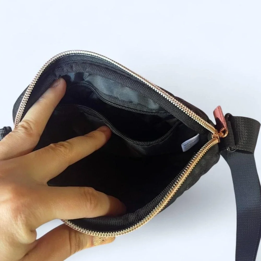 Black quilted crossbody waist bag with adjustable strap by Mytagalongs